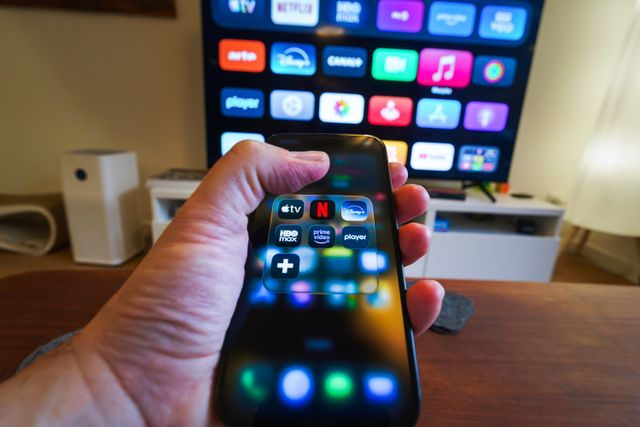 Streaming apps on a phone and smart TV across multiple operating systems